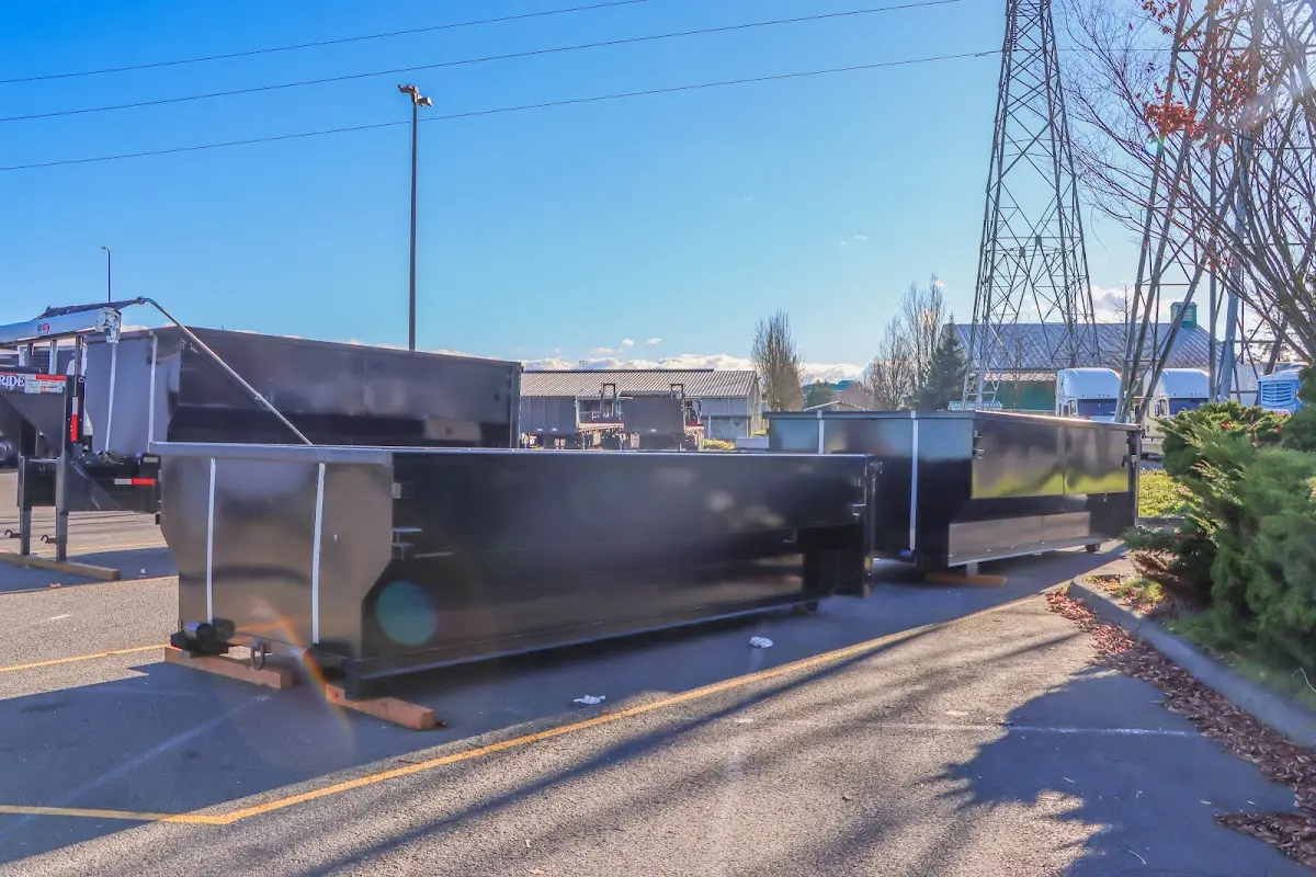 Roll-off dumpster ready for waste disposal at job site for 15 Yard Dumpster Rental in Cibolo